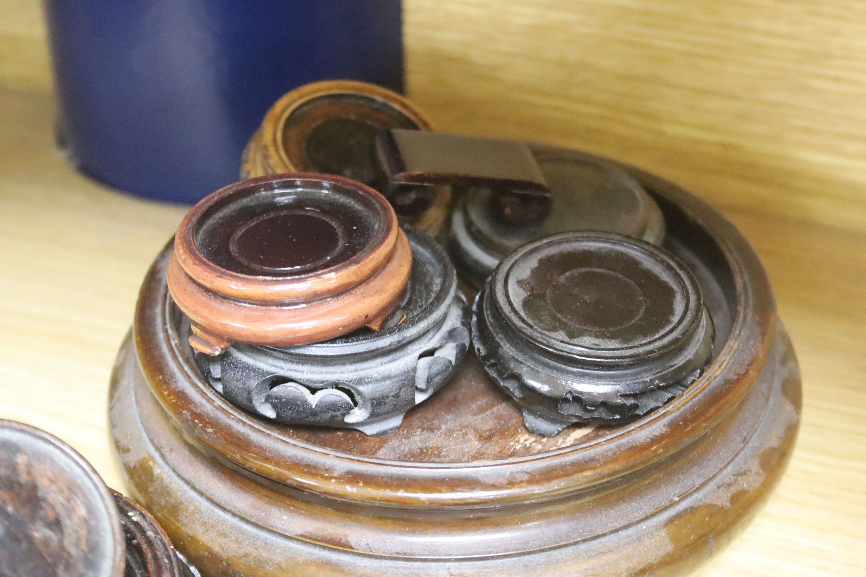 A quantity of Chinese hardwood stands and carvings